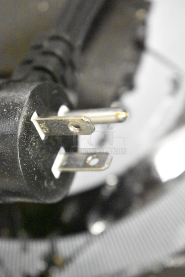 Close-up of power plug for Avantco 177IC1800P induction range; check images for potential cooktop damage, 120V, 1-phase.