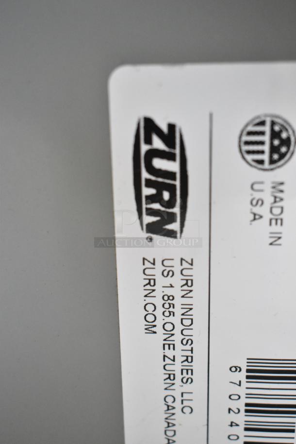 Brand new Zurn GT2700-07-2NH grease trap label, 14 lb., 7 GPM, 2" no-hub connections, made in USA, scratch and dent condition.