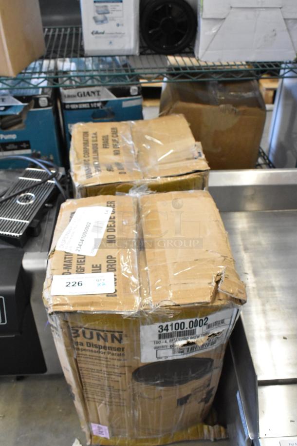 2 Bunn 34100.0002 TDO-4 Iced Tea Dispensers, 4-gallon, new with scratches and dents, in labeled shipping boxes.