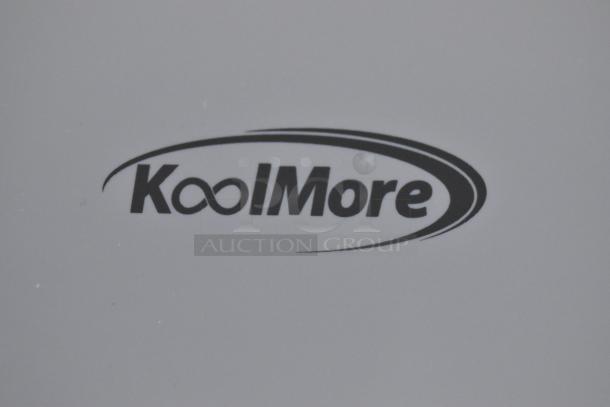KoolMore logo on a BRAND NEW SCRATCH AND DENT FLC-3CWH 2.7 cu. ft. all-in-one washer and dryer combo.