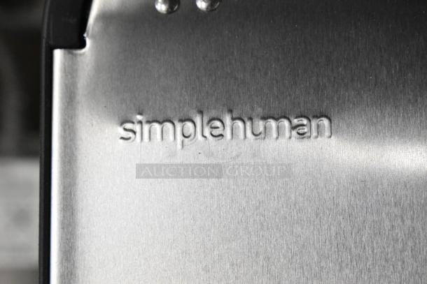 SimpleHuman stainless steel butterfly step can, 12-gallon. Brand new, slight scratch and dent. Features embossed logo.