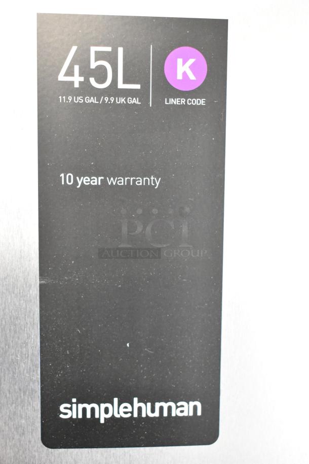 SimpleHuman 12 Gallon Stainless Steel Butterfly Step Can with 10-year warranty; liner code K, minor scratches.