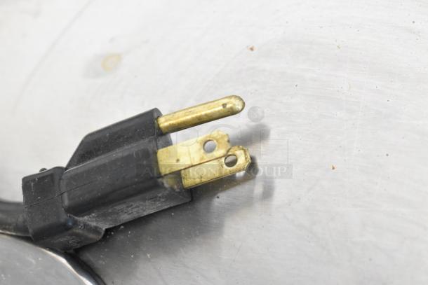 Close-up of the three-prong plug for a 2018 Micro Matic MDD 23 S E NT kegerator. Plug shows minor wear.