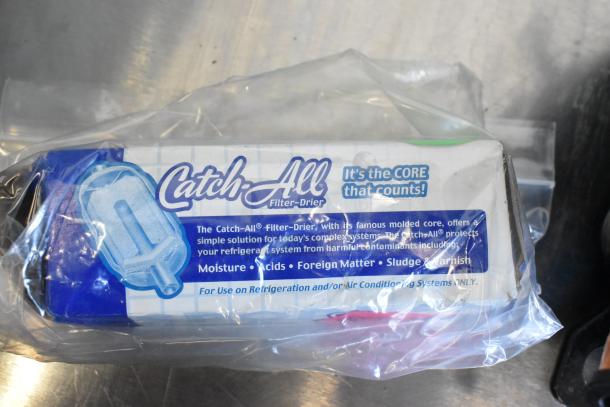 Brand new Cubigel NUT70NR compressor, 115V, 1 phase. Item labeled as "scratch and dent," indicating minor cosmetic damage.