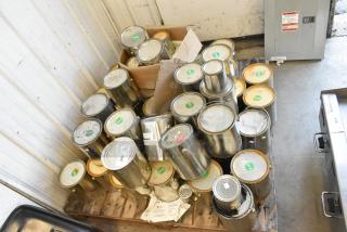 40 various Pro Guard chemical containers including Fire Brick Road EPDM Rubber and Trilene, visible tags indicating contents.