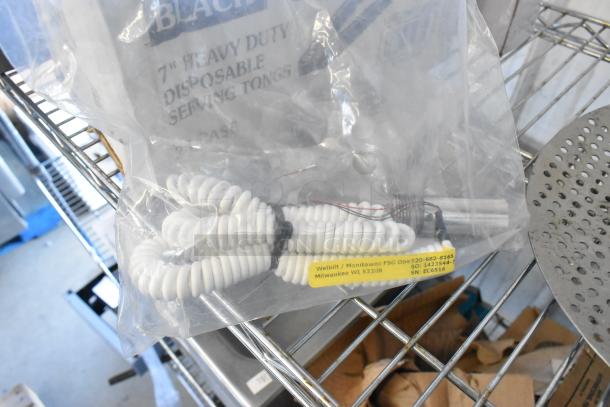 ALL ONE MONEY! tier lot with 7-inch heavy-duty disposable serving tongs and other items. Labels include Welbilt details.