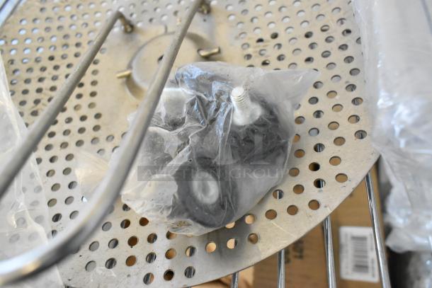 Assorted lot on a metal tray with serving tongs, sealed dice, and casters. Includes MyZone MZ-3 Band. Mixed condition.