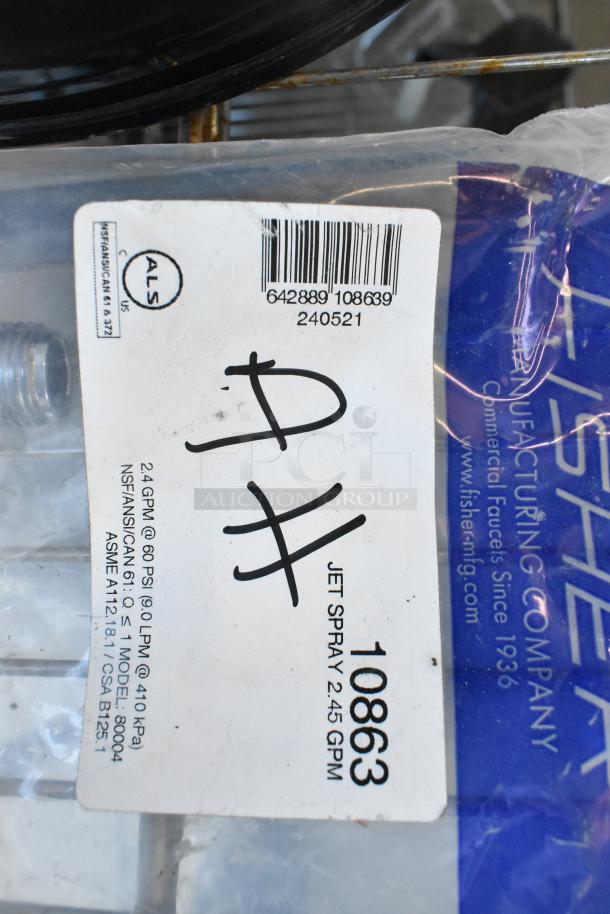 Alt text: "Fisher 10863 Jet Spray label, 2.45 GPM, in packaging with partial view of black item above it."