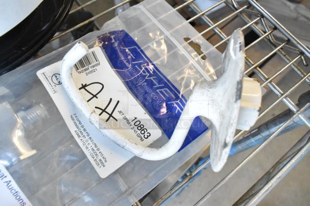 3 items: Dough hook attachment, Fisher 10863 Jet Spray, GR-133A gas connector. Packaging with visible label details.