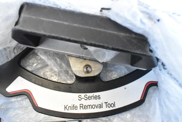 S-Series Knife Removal Tool in packaging, features ergonomic handle and visible labeling for ease of use.