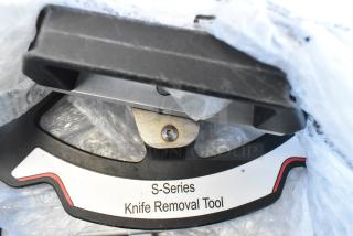 S-Series Knife Removal Tool in packaging, features ergonomic handle and visible labeling for ease of use.