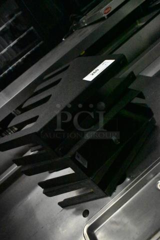 3 LID-4STAR black poly lid dispensers, stackable design. Includes visible label with item number 260. Appears in good condition.