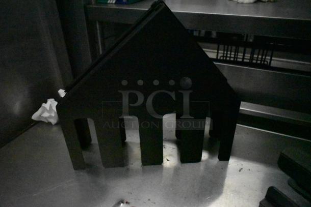 3 LID-4STAR black poly lid dispensers, four slots, sturdy construction, in good condition. Ideal for organized lid storage.