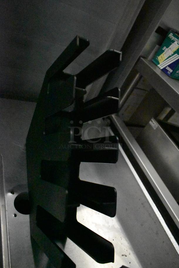 3 LID-4STAR black poly lid dispensers, stack design, durable material, suitable for commercial use.