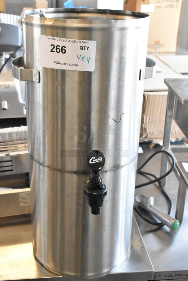 Curtis stainless steel beverage dispenser with spout and side handles, auction tag 266. Includes 2 coffee pots, whipped cream dispenser.