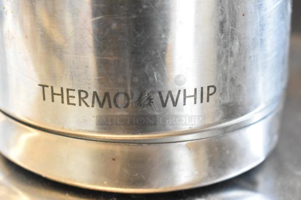Stainless steel Thermo Whip dispenser with engraved label, part of a lot including Curtis beverage holder and coffee pots.