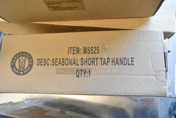 9 brand new tap handles in boxes, including models MS525, SUM-OKTT-2, SUM05-0006-01, MAD05-0422-11, sealed.