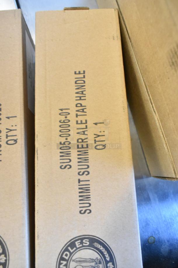 Brand new tap handle box labeled SUM05-0006-01 Summit Summer Ale. Includes 9 tap handles total, such as MS525.