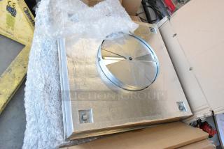 CaptiveAire DI-PSP-12-24X24 Diffuser in original packaging, metallic finish, new condition, partially covered with bubble wrap.