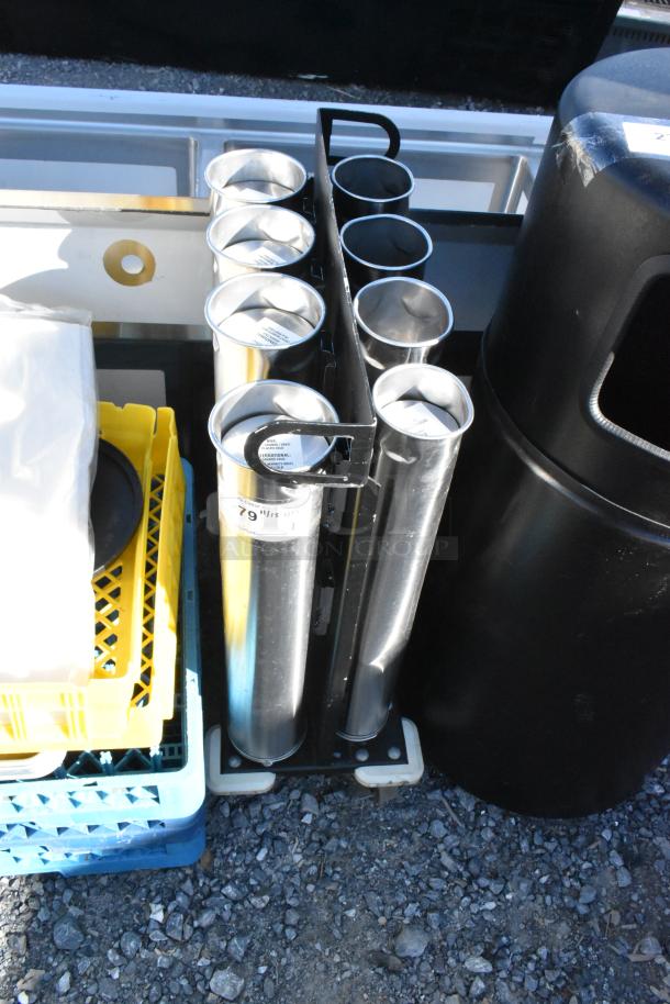 Metal 8 Chute Cup Dispenser on commercial casters, showing eight cylindrical chutes, in good condition.