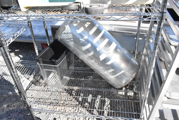 Chrome finish 4-tier wire shelving unit on commercial casters, includes contents. Buyer must dismantle. Consider freight costs.