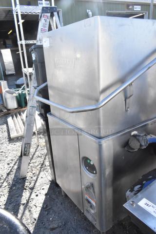 Hobart AM15 stainless steel commercial dishwasher, straight pass-through design. Features 480 volts, 3 phase power. Used condition.