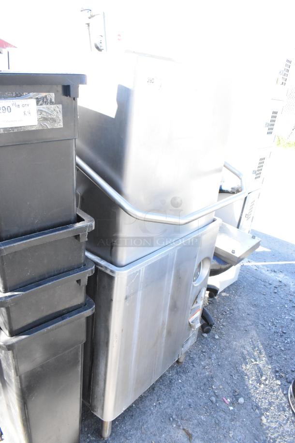 Hobart AM15 stainless steel pass-through dishwasher; commercial use; 480 volts, 3 phase; visible wear.