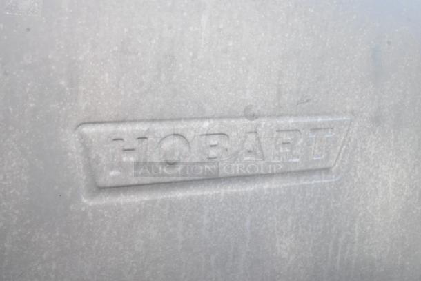 Hobart AM15 commercial dishwasher, stainless steel, embossed logo detail, 480V, 3 phase, straight pass through design.