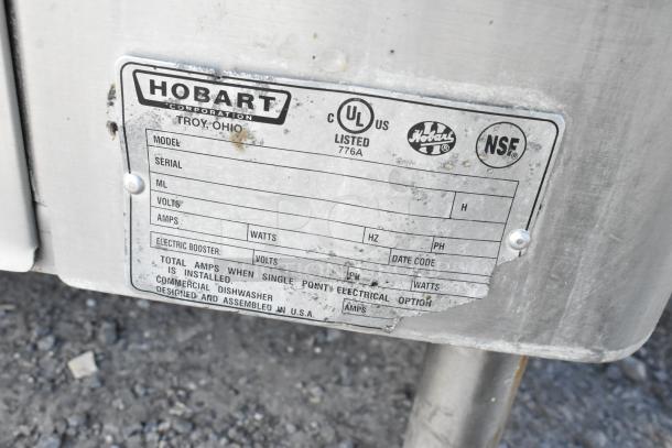 Hobart AM15 stainless steel commercial dishwasher label, 480V, 3-phase, NSF certified. Model, serial, and voltage details visible.