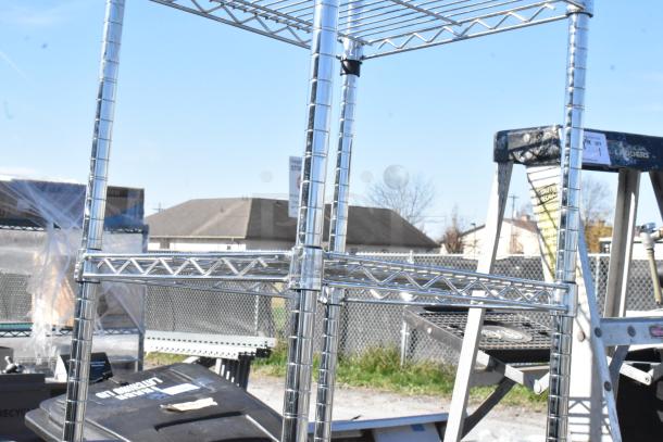 Chrome finish 5 tier wire shelving unit in good condition. Buyer must dismantle. Consider freight charges.