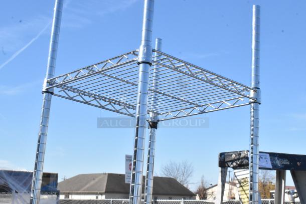 Chrome finish 5-tier wire shelving unit in good condition. Buyer must dismantle. Consider freight charges.