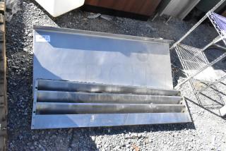 Two metal pieces: a wall mount shelf and kickplate for reach-in, in good condition. Label shows quantity details.