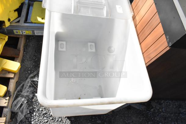 White poly ingredient bin with lid, on commercial casters. Good condition, spacious interior, ideal for storage.