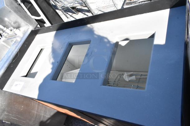 Wood pattern trash can shell, three deposit holes, two doors, visible label indicating size. Used condition.