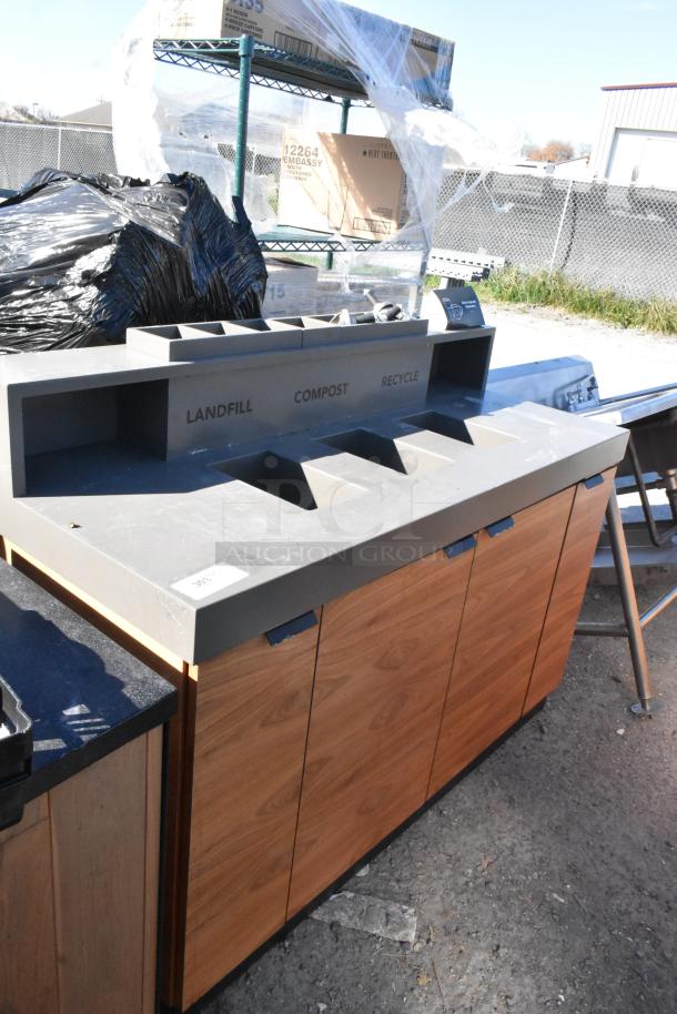 Wood pattern trash can shell with three deposit holes labeled landfill, compost, recycle, and four doors; outdoor setting.