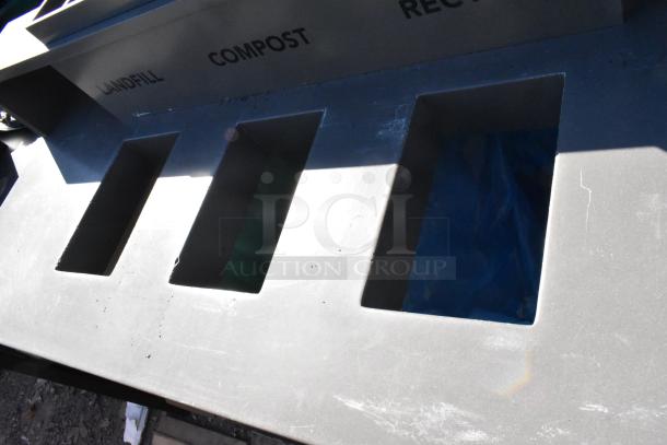 Wood pattern trash can shell with three labeled deposit holes for landfill, compost, and recycling. Features four doors.