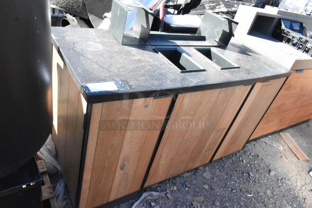 Wood pattern trash can shell with two trash deposit holes and three doors, features a dark countertop, visible item tag.