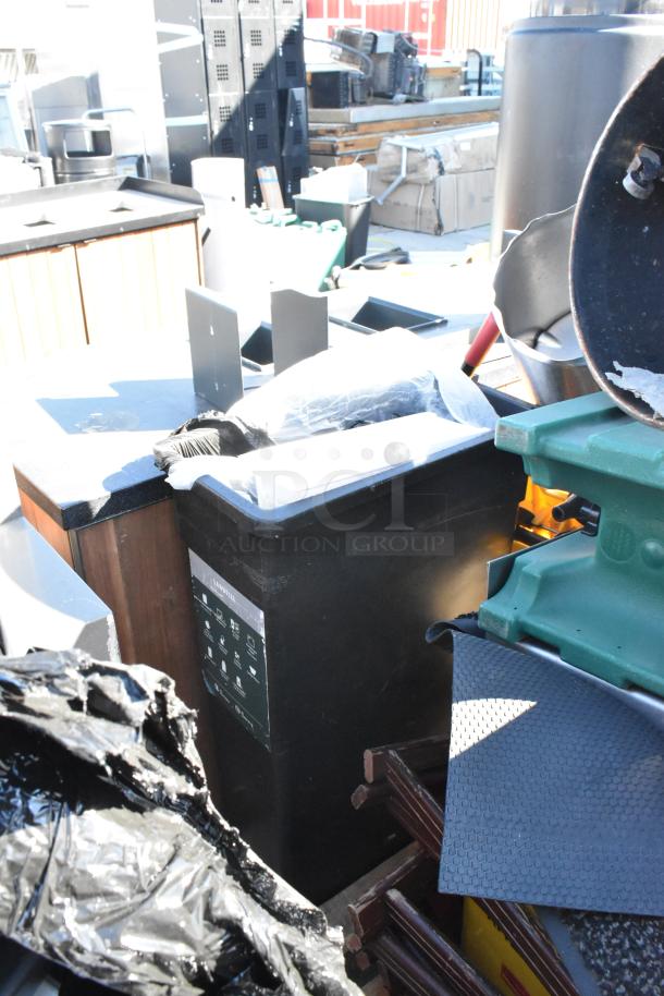 Pallet lot with various items including floor mats, stool, serving tray stands. Mixed condition. Ideal for bulk buyers.