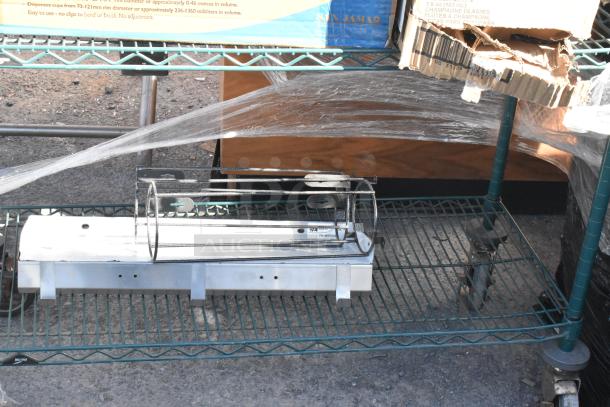 Green 4-tier wire shelving unit containing EZ Fit cup dispensers and Libbey glass boxes. Dismantling required for buyer.