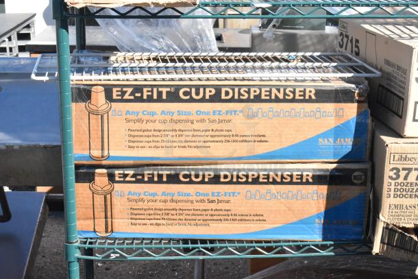 Green finish 4-tier wire shelving unit with EZ Fit cup dispensers, boxes of 3715 Libbey Embassy Royale and 3773 Libbey glasses.