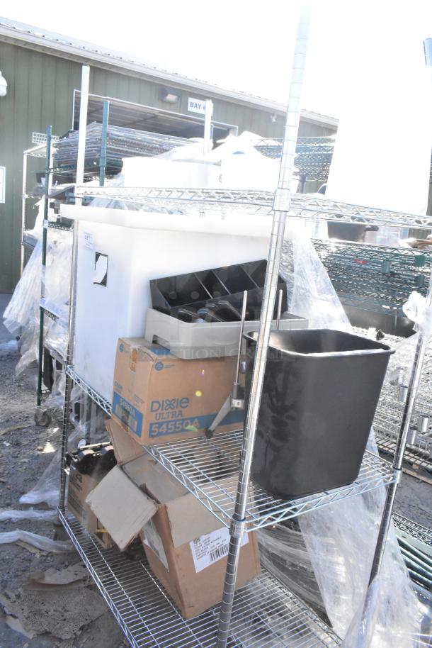 Chrome 3-tier wire shelving unit with trash bin, Libbey beer glasses, Dixie Ultra 54550A dispenser. Buyer dismantles.