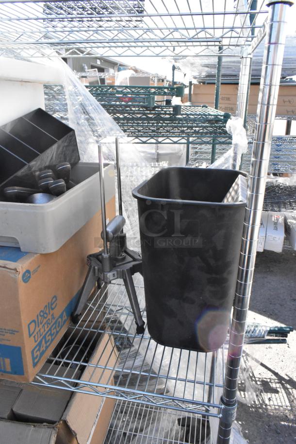Chrome finish 3-tier wire shelving with trash bin, Libbey beer glasses, and Dixie Ultra 54550A dispenser. Buyer dismantles.