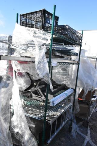 Green finish 4-tier wire shelving unit with metal shelves and contents. Buyer to dismantle. Consider freight charges.