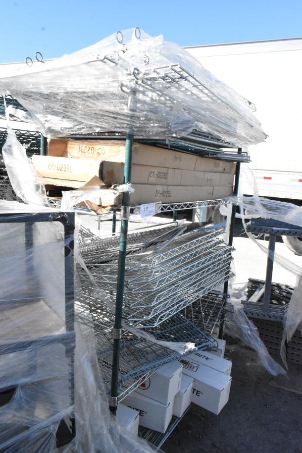 Chrome and green 5-tier wire shelving unit on casters with contents. Includes boxed items. Buyer must dismantle.