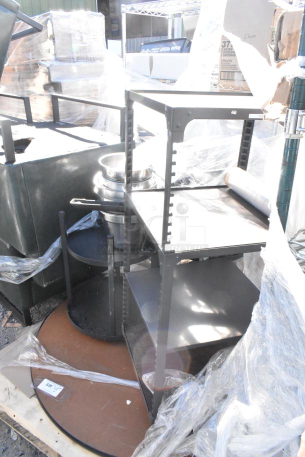 Pallet lot with metal cart and tabletop, packaged in plastic. Includes additional various items. Condition: Unspecified.