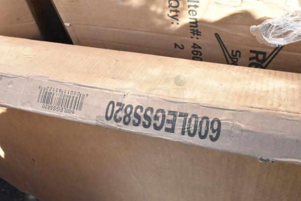 Box labeled "600LEGSS820" containing Regency stainless steel table legs, part of a scratch and dent auction lot.