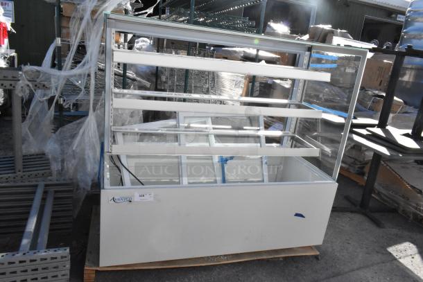 Avantco 193BCFD60W 59" white bakery display case with LED lighting, new condition, 110-120 volts, on a pallet.