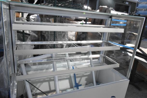 Avantco 193BCFD60W white bakery display case, 59 1/8", LED lighting, new condition. 110-120V, 1 Phase.