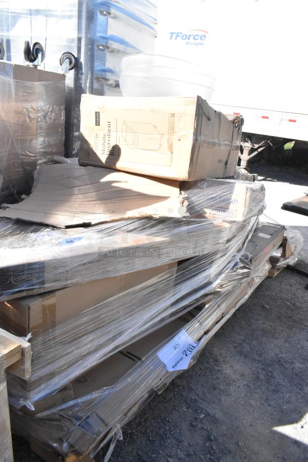 Pallet of 15 new scratch and dent items, including dish cabinet, traffic door, and strip warmer, wrapped in plastic.
