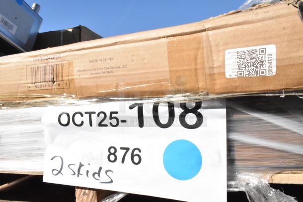 Cardboard boxes labeled "OCT25-108" and "Made in China" on pallets, with visible barcodes and QR codes.